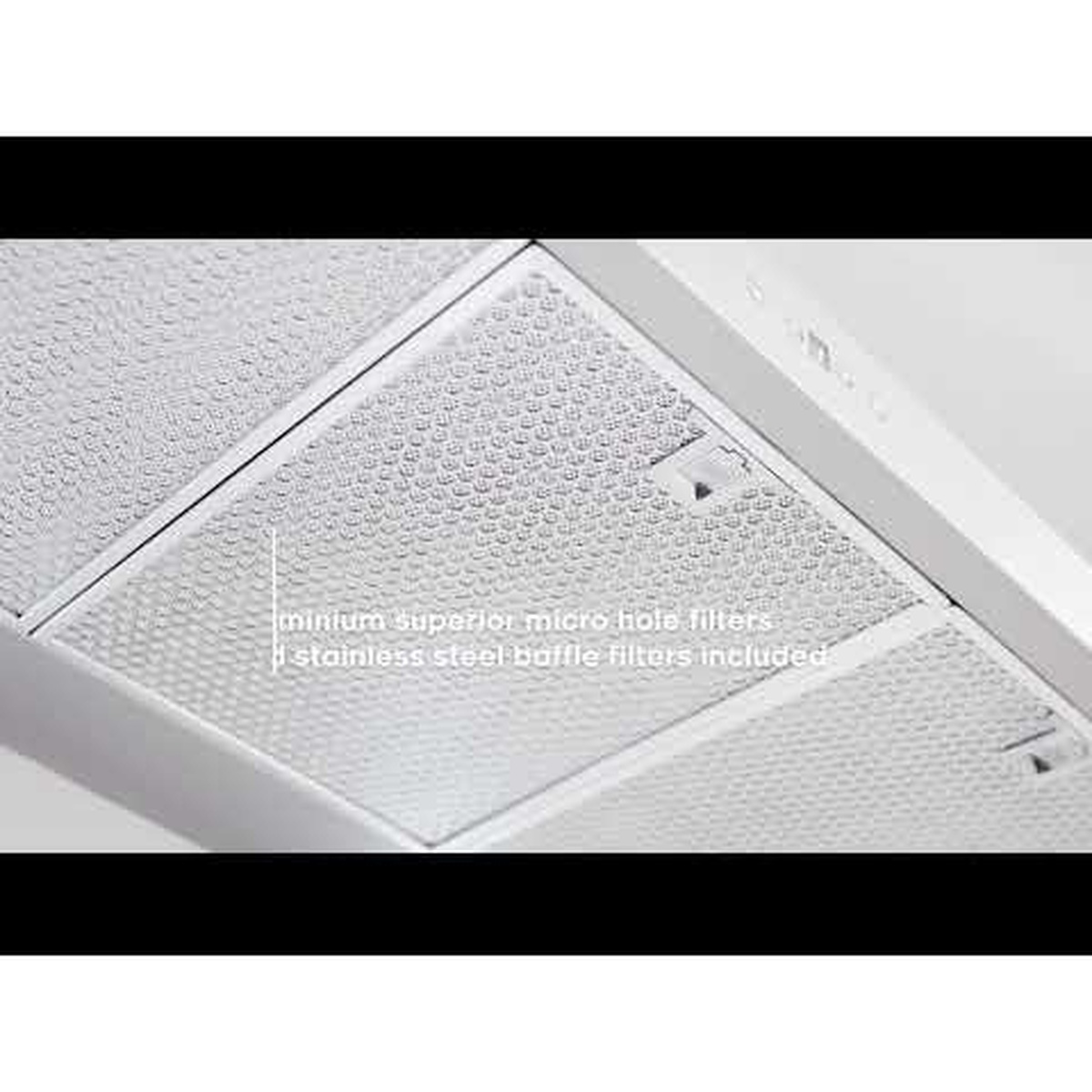 Close-up of the underside filter area of a range hood showing the filter panel