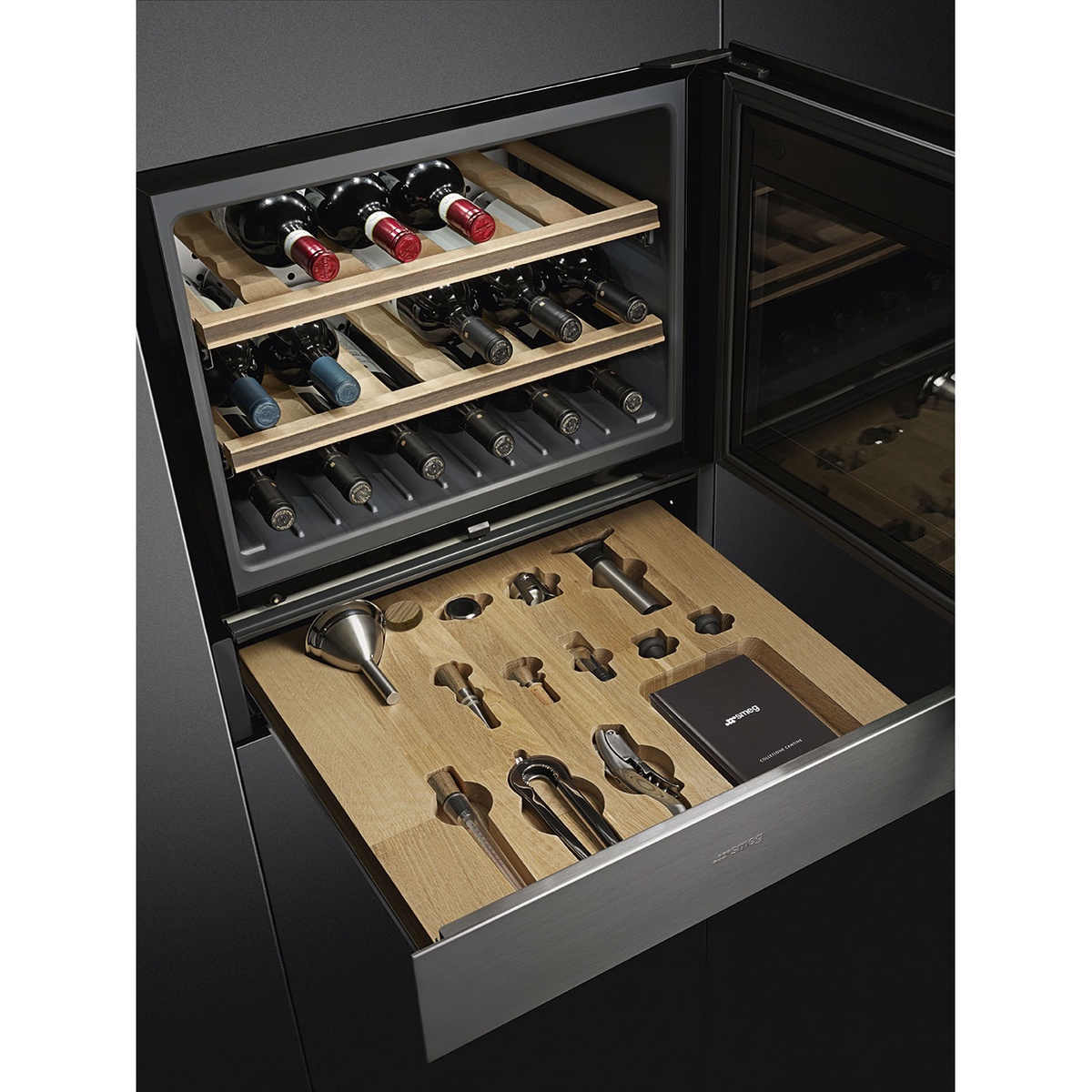 Built-in Smeg installation showing a wine cooler above and the sommelier drawer open below with the wooden accessory tray
