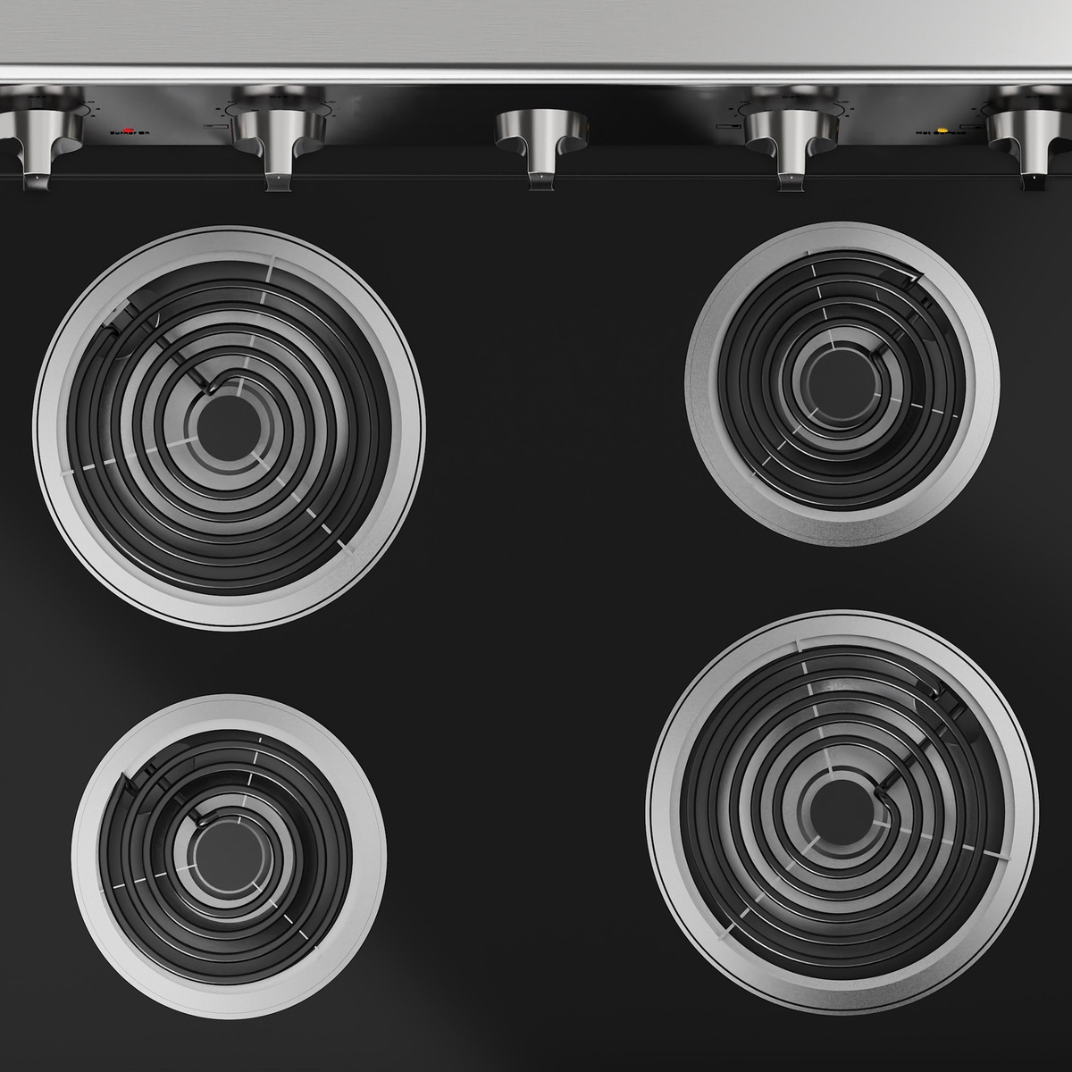 Close-up overhead view of four coil burners on the Elements EECR34MES-CA electric range with rear knob controls visible