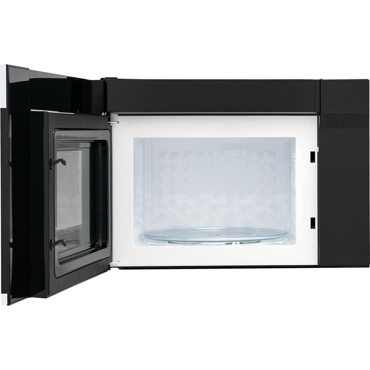 Microwave interior with the door open, showing the cavity and glass turntable