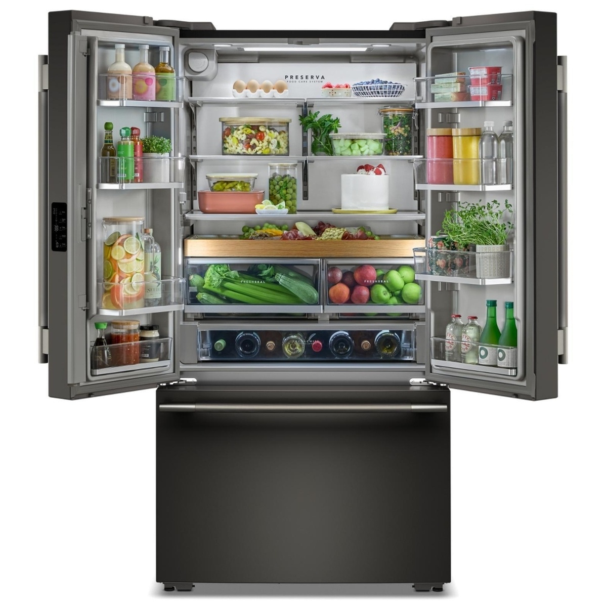 Open KitchenAid French door refrigerator showing platinum-colored interior with adjustable shelves, door bins, wood-look sliding tray, crispers, and a full-width pantry drawer