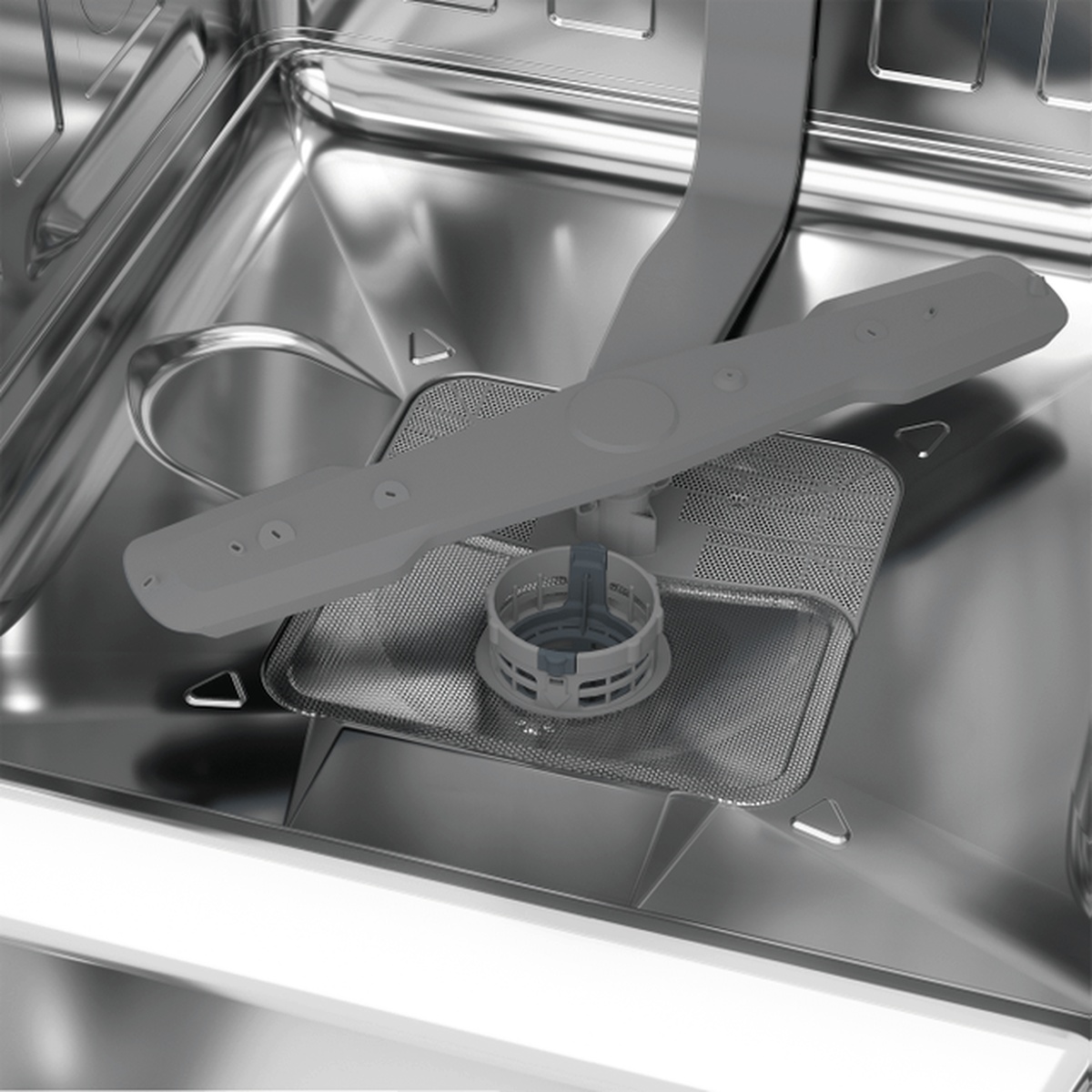 Beko dishwasher stainless steel interior showing spray arm and mesh filter at the bottom of the tub