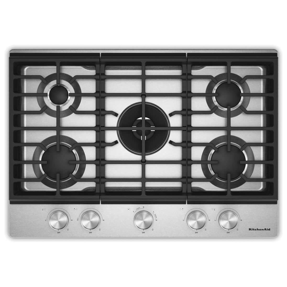 Top-down view of the KitchenAid KCGK530SSS showing all five sealed burners including the center dual-ring burner, continuous cast-iron grates, and five front stainless steel knobs