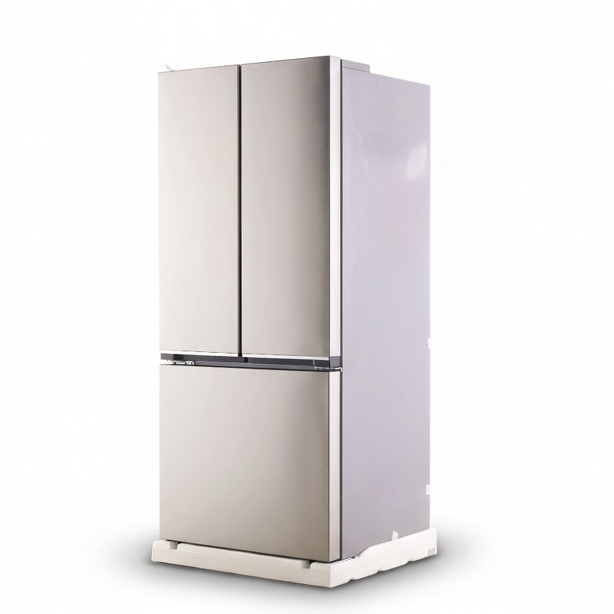 Angled view of a fingerprint-free stainless steel Beko French door refrigerator with a bottom freezer drawer