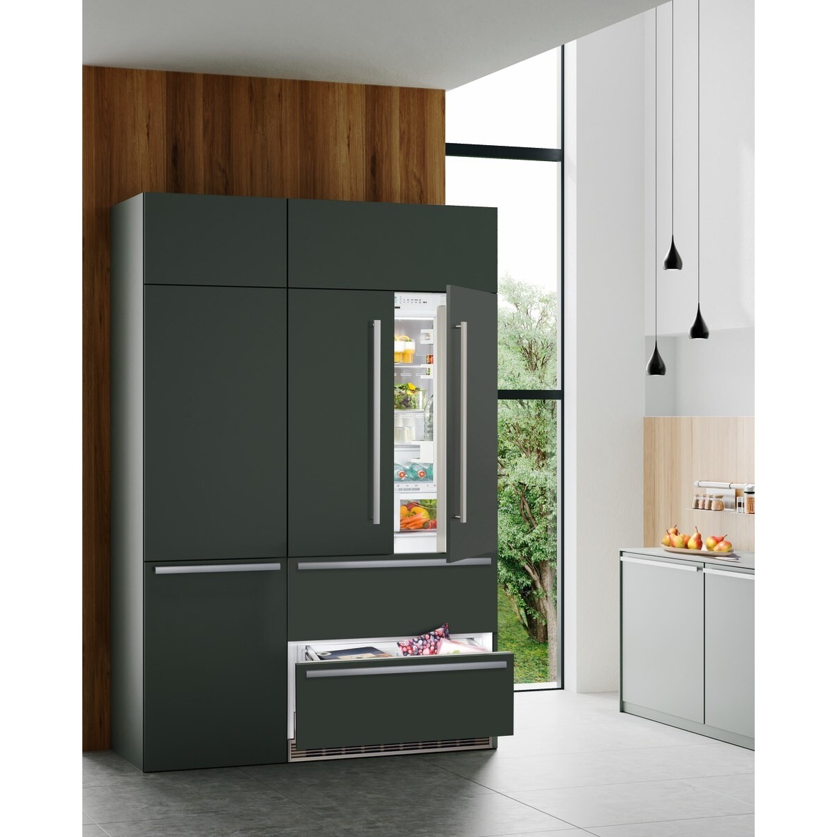 Panel-ready built-in refrigerator installed in modern kitchen cabinetry with integrated handles
