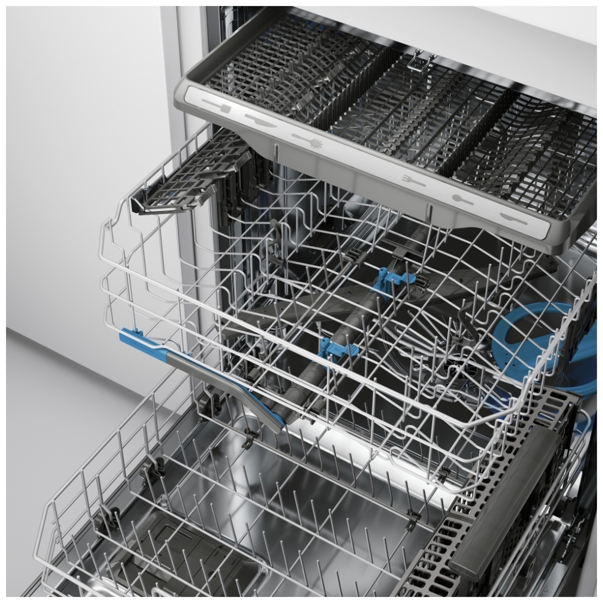 Close-up of the dishwasher interior showing the third rack and adjustable upper rack system