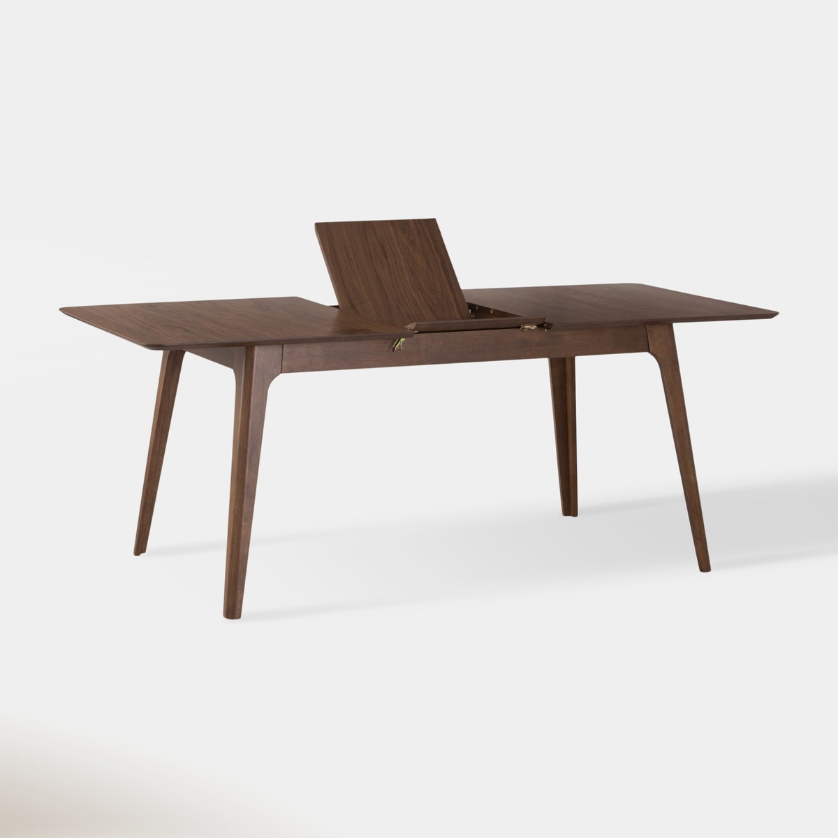 Venn Extendable Dining Table in Walnut with self-storing butterfly leaf partially open, showing the extension mechanism