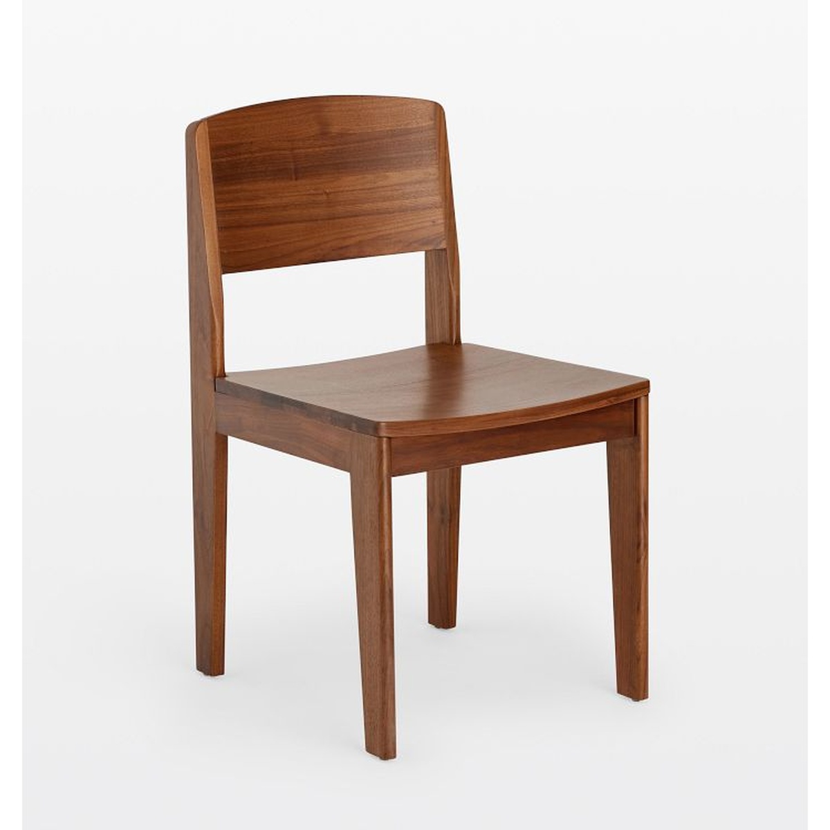 Anders Dining Chair in walnut finish shown against a clean white background, highlighting the arched backrest, contoured wood seat, and four tapered legs