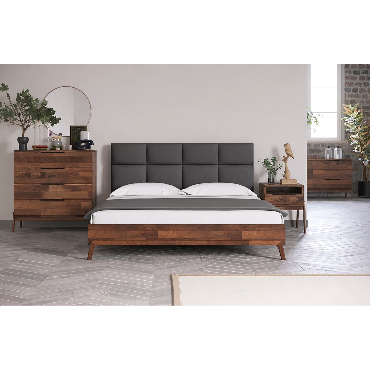 Styled bedroom scene featuring the HOFT Remix collection including the 4-drawer chest, a matching dresser, nightstand, and solid acacia bed frame with an upholstered headboard