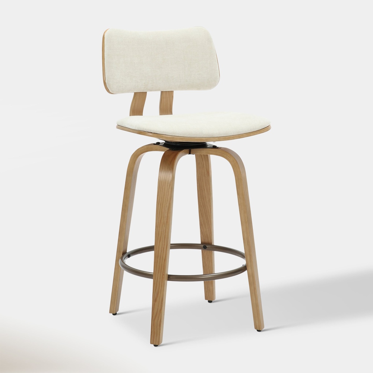 Beige upholstered counter stool with natural bentwood legs, padded backrest, and circular metal footrest