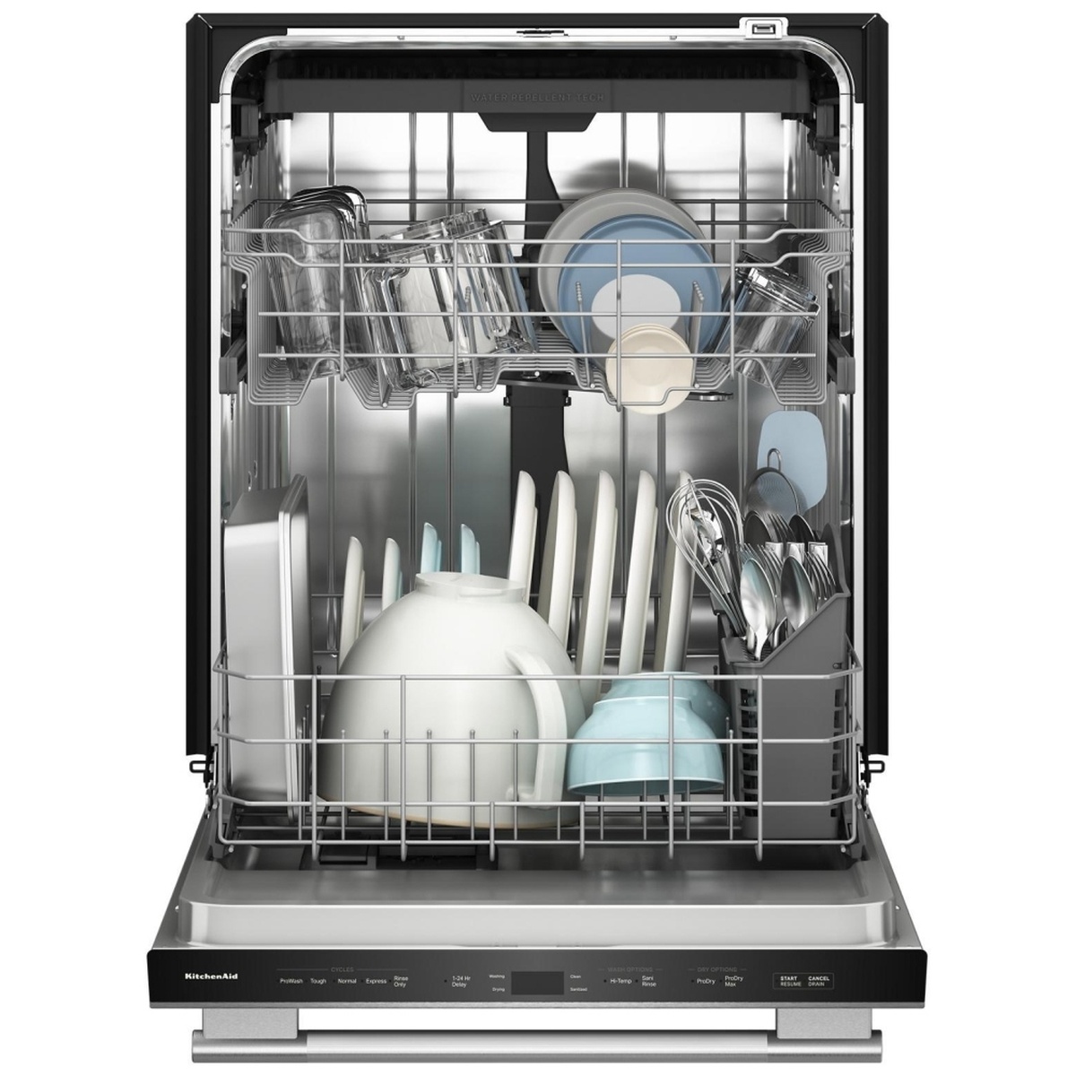 KitchenAid KDTS224SPS loaded with dishes, bowls, a teapot, and utensils across upper and lower racks with stainless interior visible