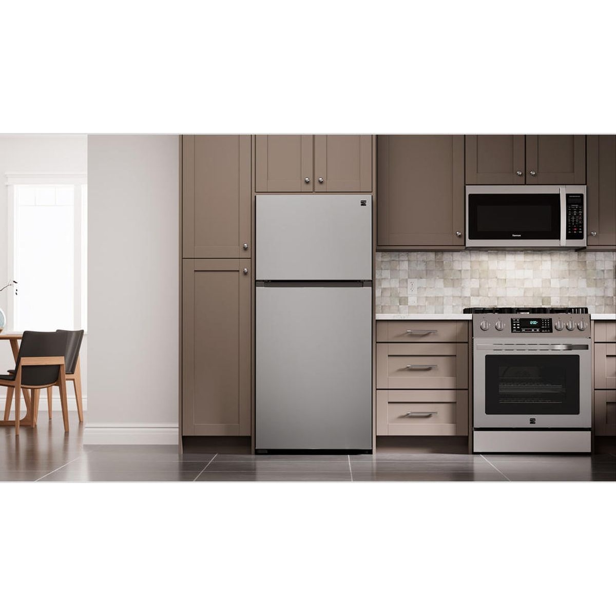 Kenmore stainless steel top freezer refrigerator installed in a modern kitchen