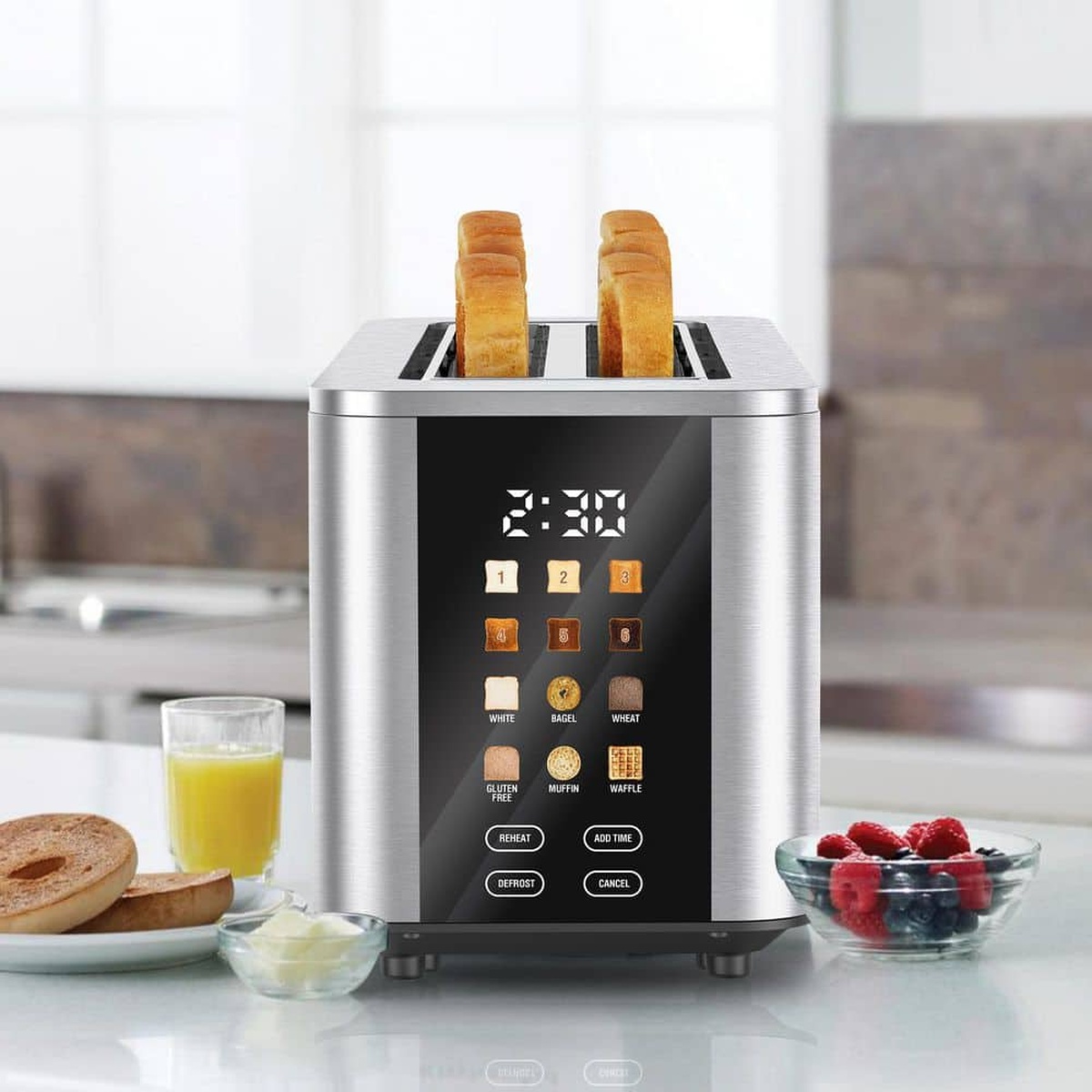 Kenmore stainless steel long-slot toaster on a kitchen counter with touchscreen and two slices of bread