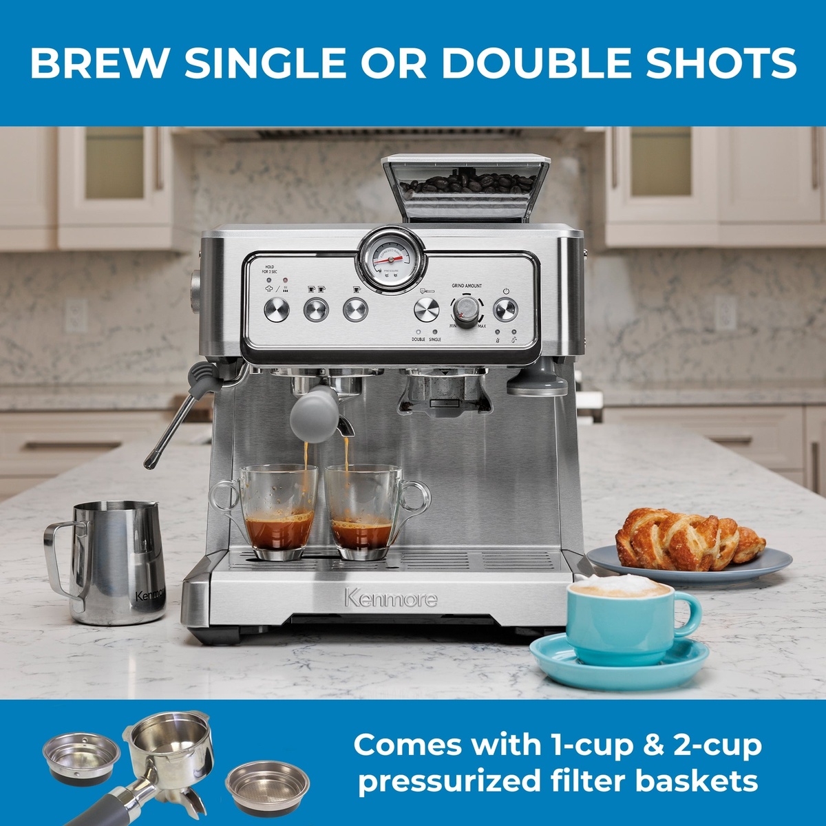 Kenmore espresso machine brewing two espresso shots on a kitchen counter, with coffee beans in the top hopper and a steam wand on the left.