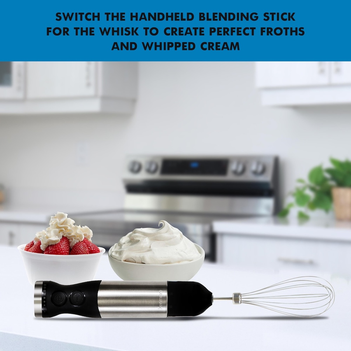 Kenmore hand blender motor body laid horizontally with whisk attachment beside bowls of whipped cream and strawberries
