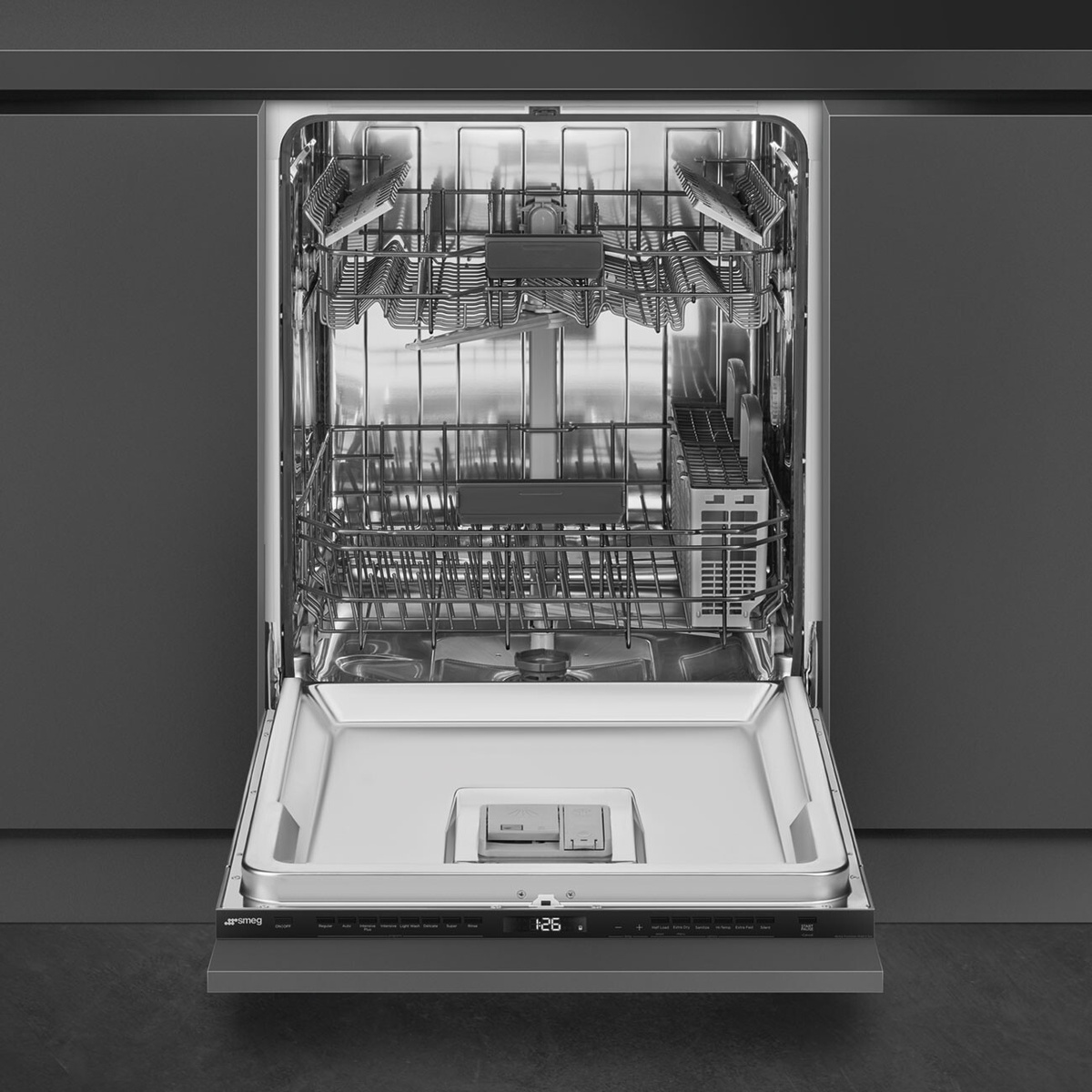 Smeg DW8600 dishwasher open, showing stainless steel interior with upper and lower racks and top-edge control panel