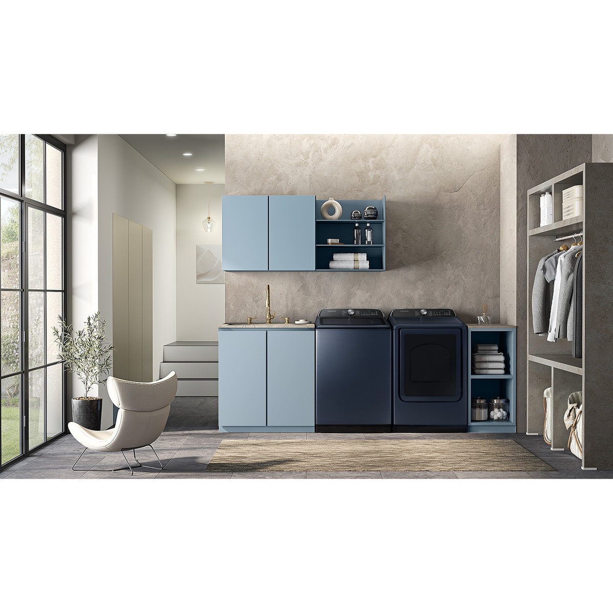 Samsung navy washer and dryer pair installed in a modern, design-forward laundry room with blue cabinetry and organized shelving