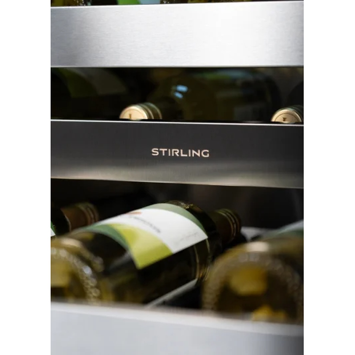 Close-up of Stirling-branded stainless steel wine shelf with white wine bottles resting on the rack
