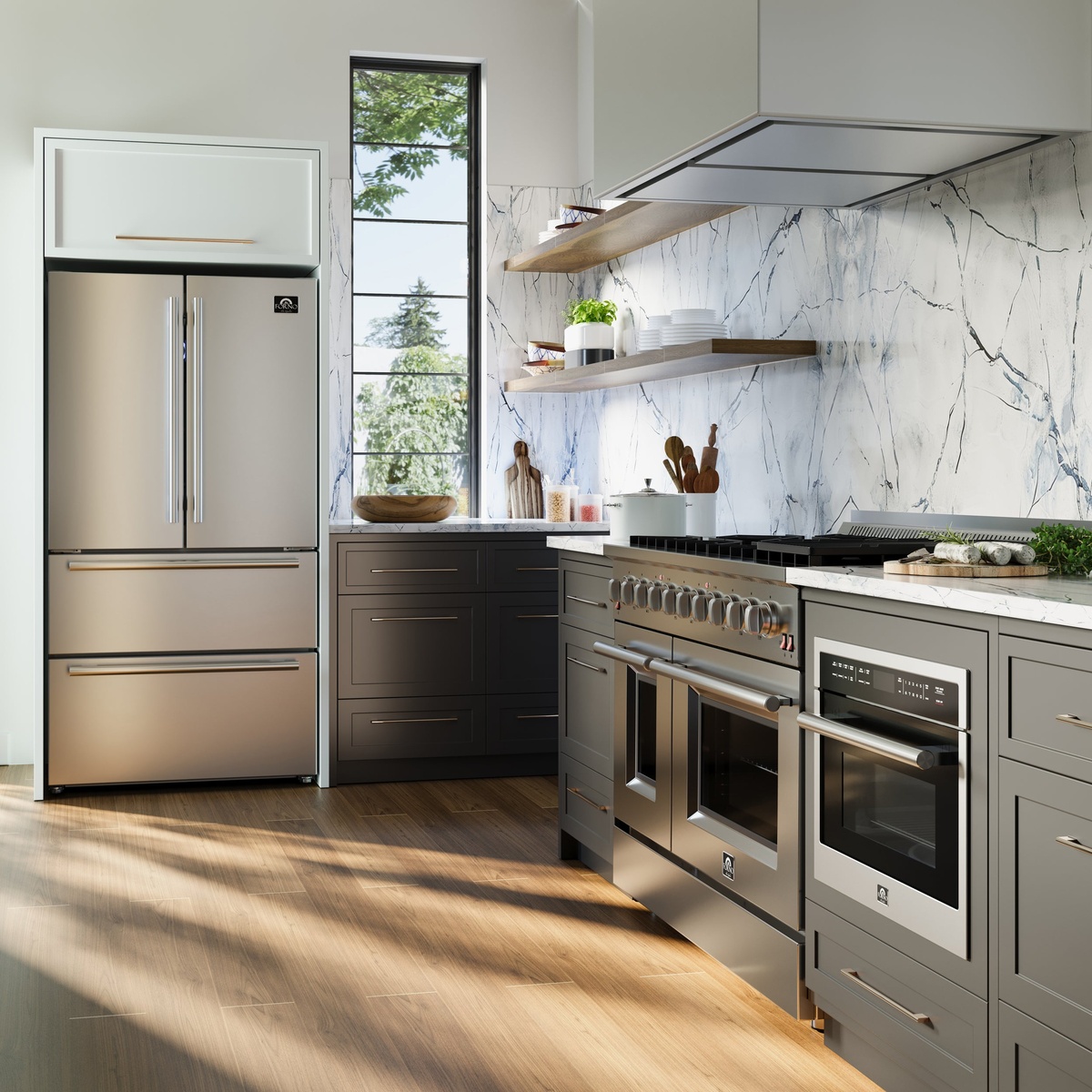 Forno kitchen suite lifestyle photo showing stainless steel range, refrigerator, and microwave installed in a modern kitchen with marble backsplash and grey shaker cabinetry