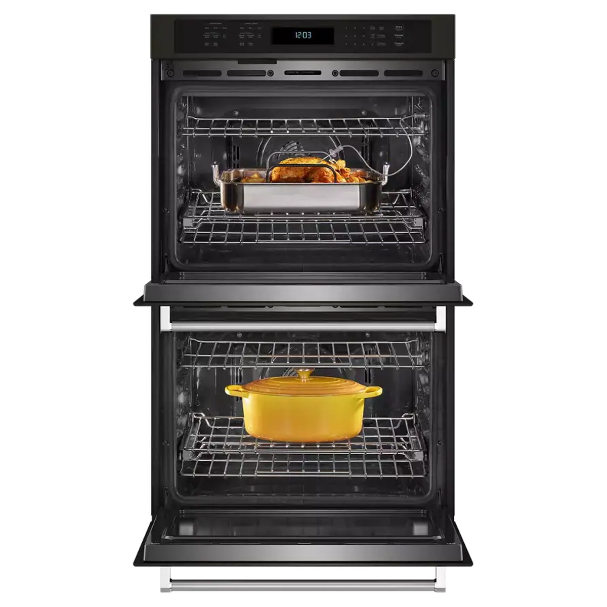 KitchenAid 27-inch double wall oven with both doors open, upper cavity holding a roasting pan with chicken and a meat thermometer probe, lower cavity with a yellow Dutch oven on wire racks