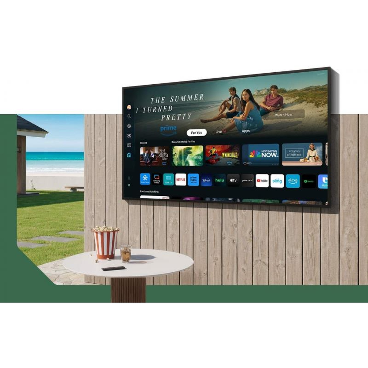 Samsung The Terrace outdoor TV mounted on an exterior wall showing the smart TV home screen