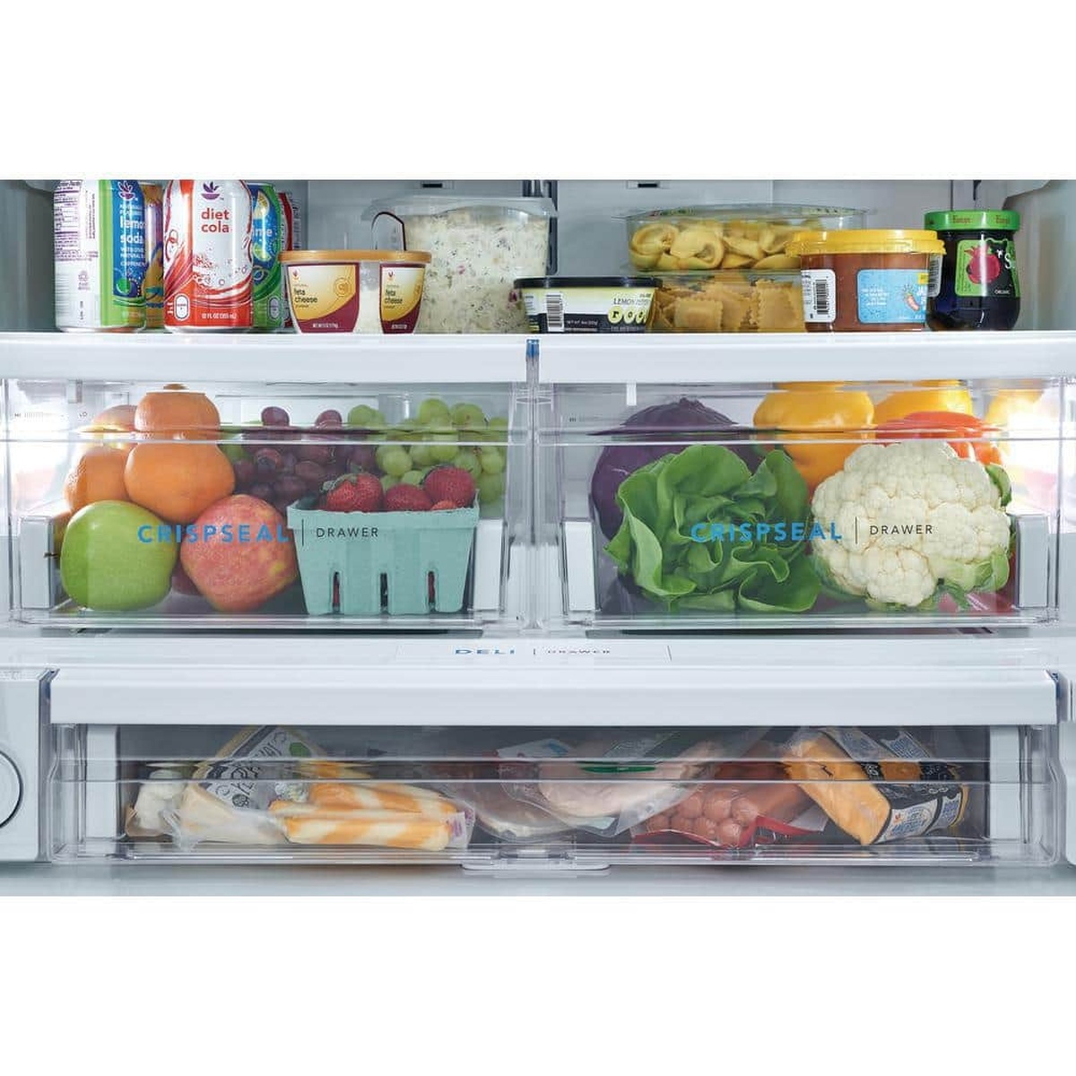 Refrigerator interior showing two CrispSeal produce drawers above a full-width deli drawer