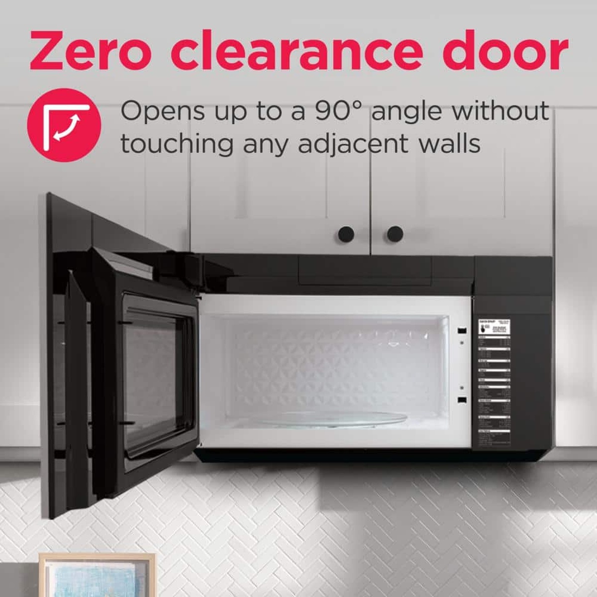 Microwave shown open in a kitchen cabinet setting with text calling out a zero clearance door that opens up to a 90 degree angle