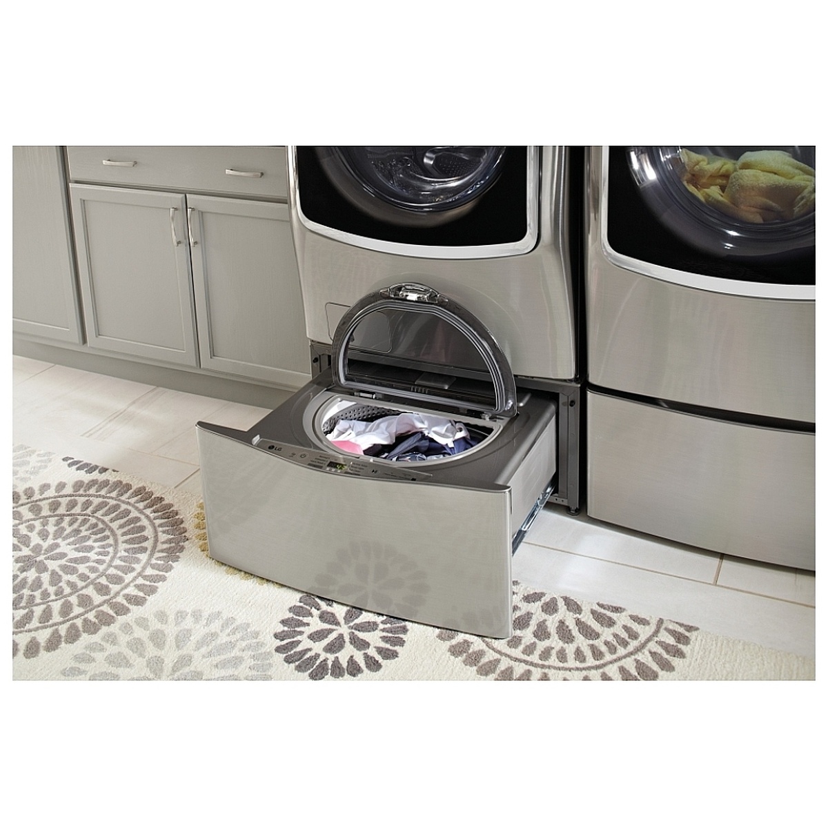 LG SideKick pedestal washer installed under a front-load washer with the drawer open