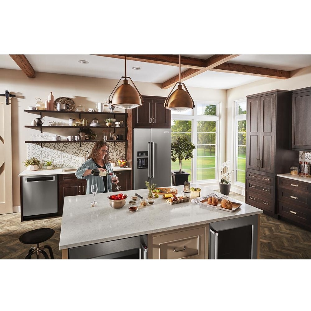 KitchenAid side-by-side refrigerator installed in a modern kitchen